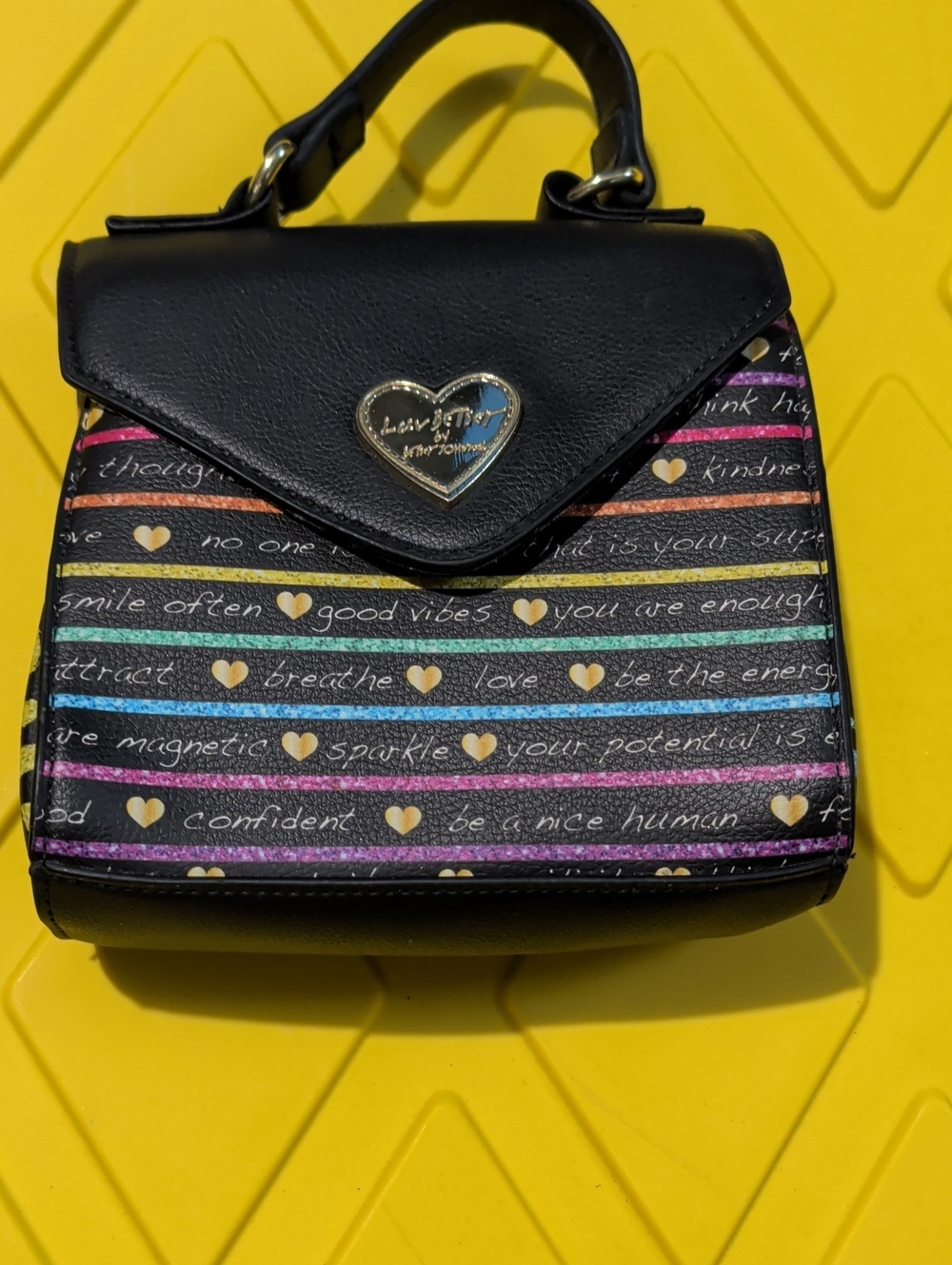 Luv Betsey by Betsey Johnson Positive Verbiage Rainbow Crossbody Bag.